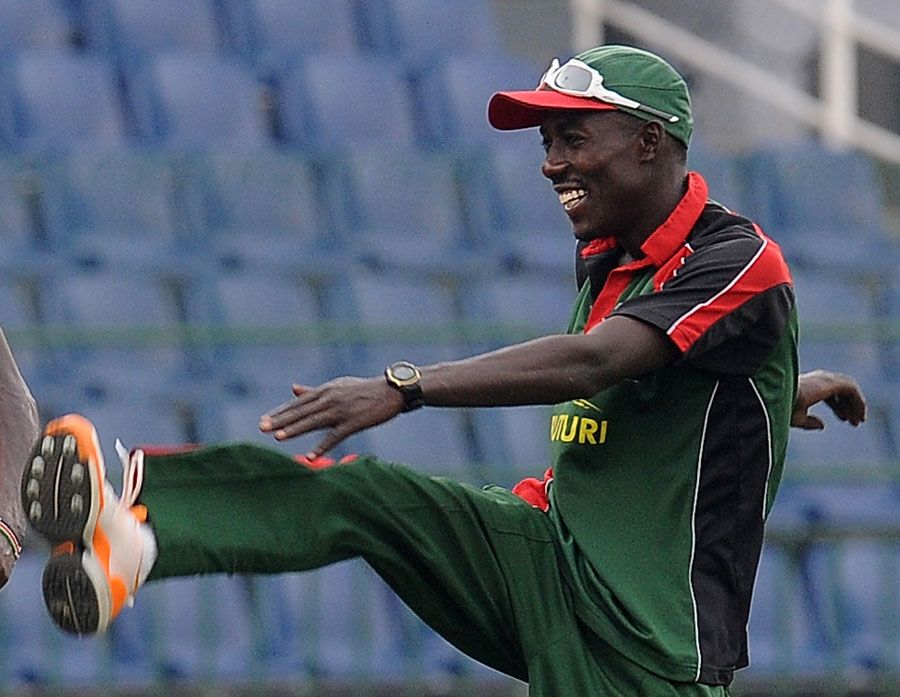 Jimmy Kamande warms up during Kenya's training session