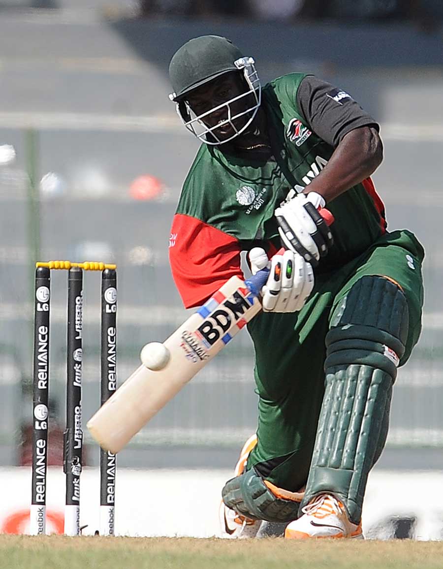 David Obuya drives down the ground during his 51