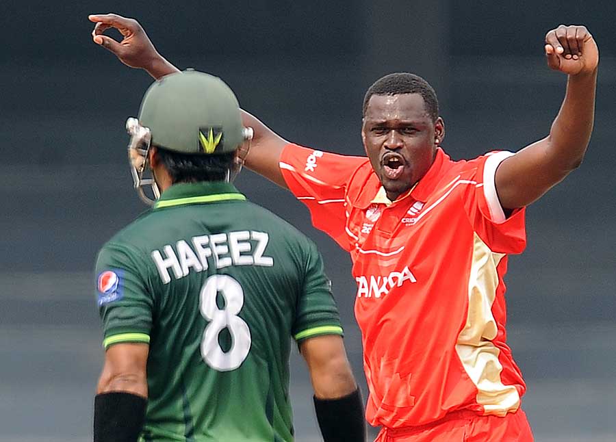 Henry Osinde exults after snaring Mohammad Hafeez
