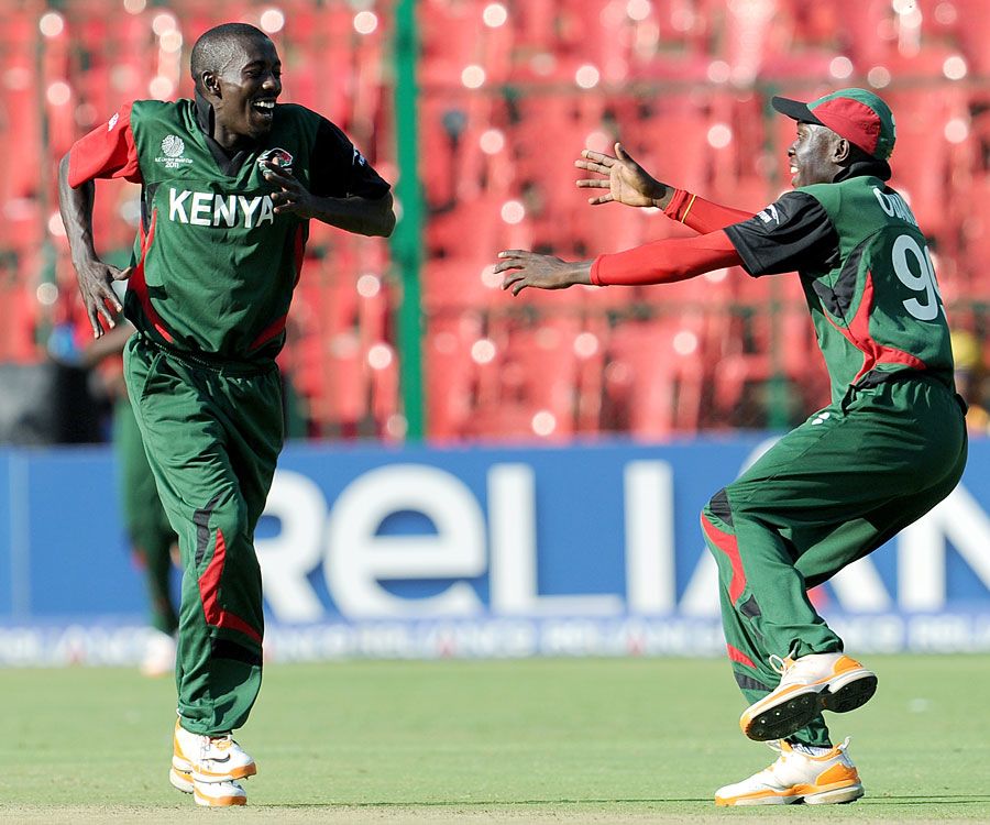 Jimmy Kamande celebrates the wicket of Cameron White
