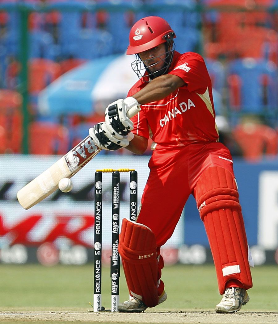 Hiral Patel winds up to lift the ball for a boundary