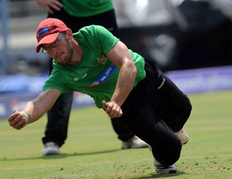 Charles Coventry fields during Zimbabwe's training session