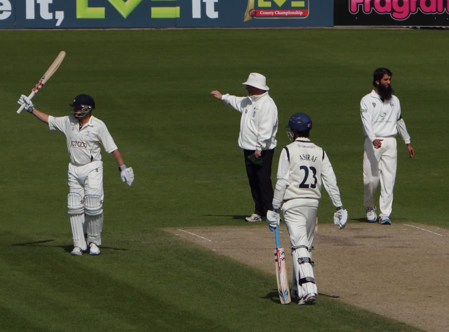 Gerard Brophy acknowledges the applause after passing 150