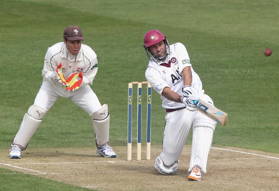 Andrew Hall sweeps during his half-century against Kent