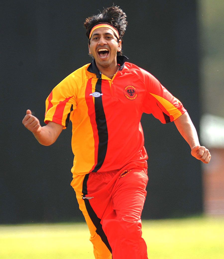 Rana-Javed Iqbal celebrates a wicket