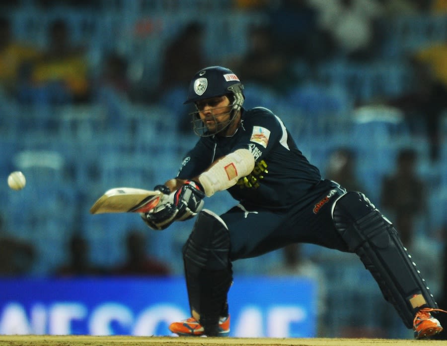 Sunny Sohal reaches out to hit the ball