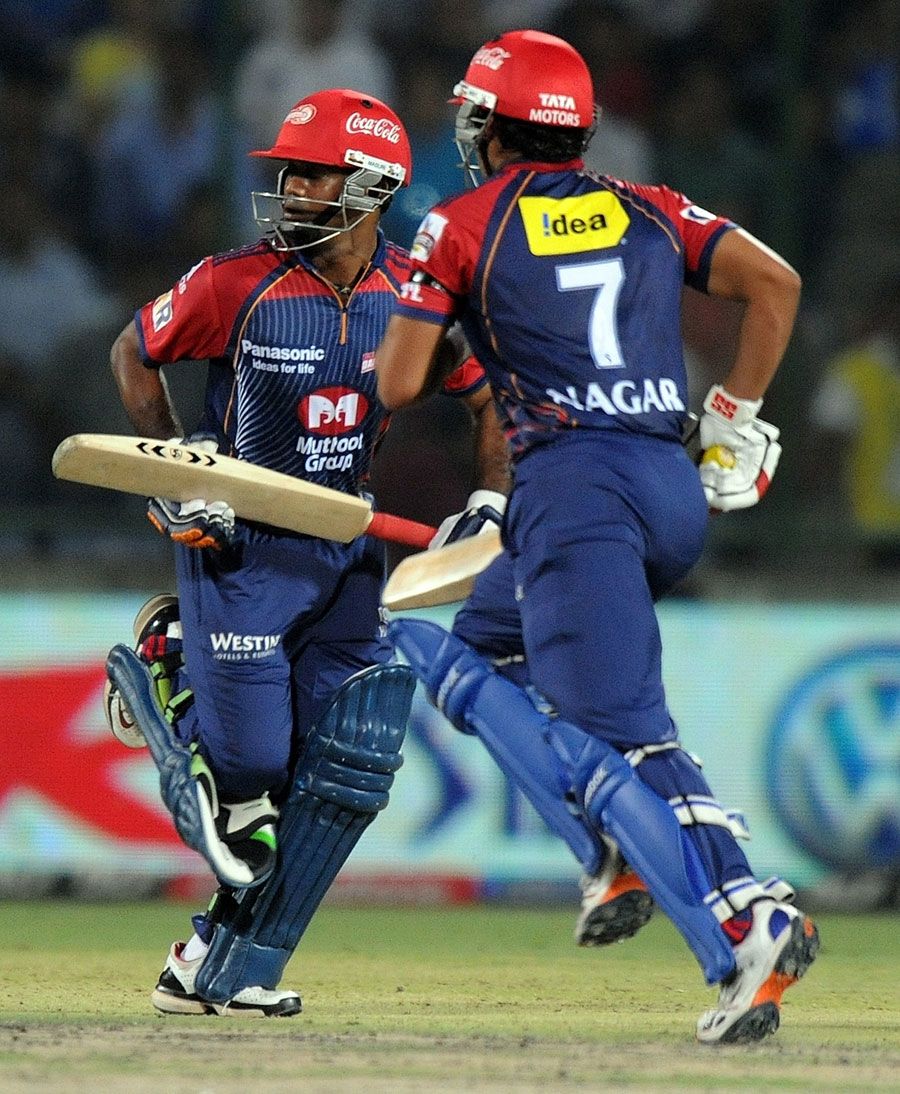 Yogesh Nagar and Venugopal Rao run between the wickets during a 54-run stand