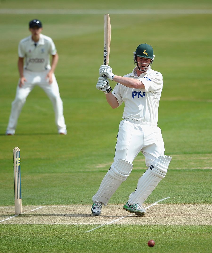Neil Edwards pulls during his 64