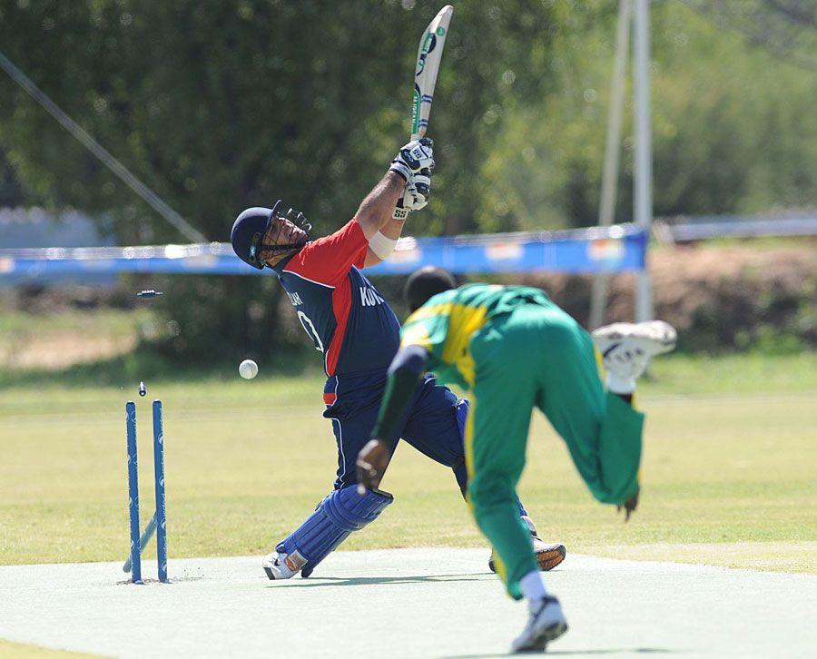 Abdullah Akhunzada is bowled by Saheed Akolade