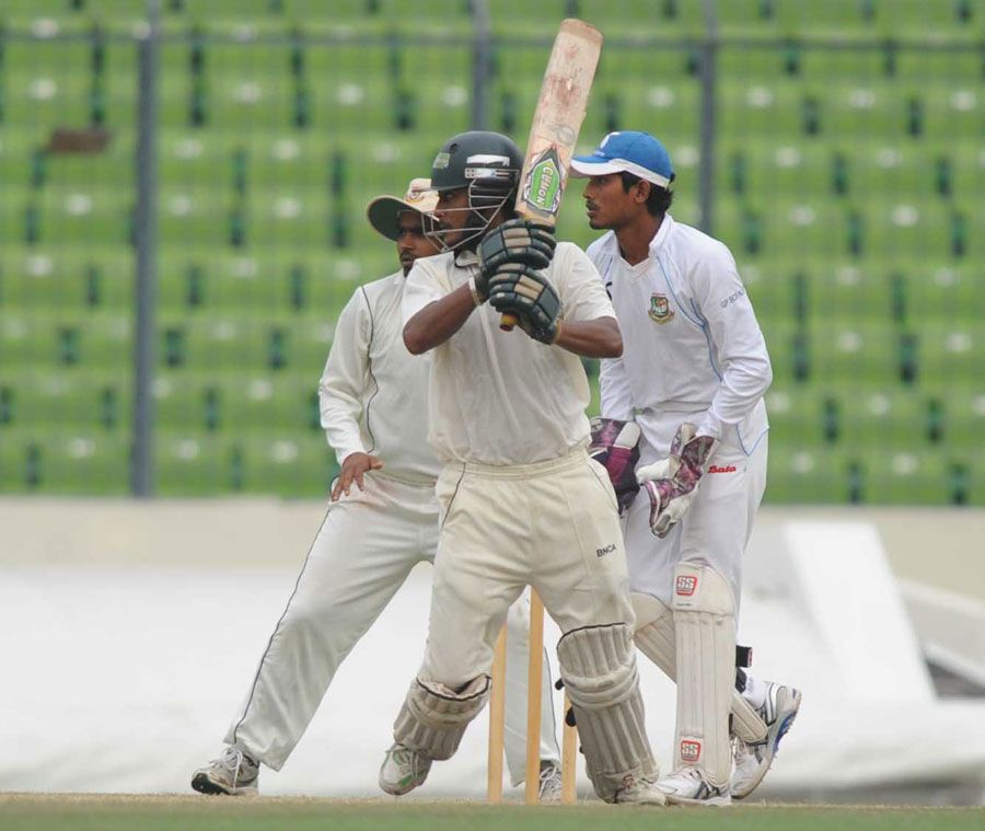 Dhiman Ghosh strokes one through the off side