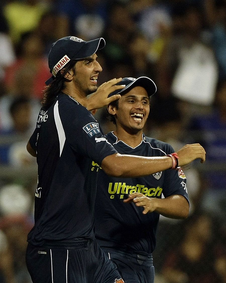Ishant Sharma took a catch to send Andrew Symonds back