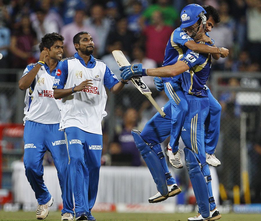 James Franklin is mobbed by his team-mates after Mumbai's win