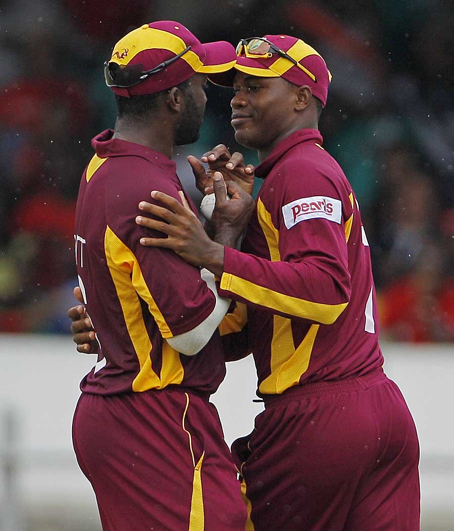 Danza Hyatt and Marlon Samuels almost collided while attempting a catch