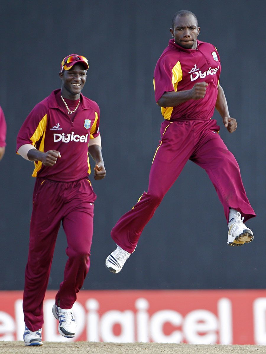 Anthony Martin celebrates taking Parthiv Patel's wicket
