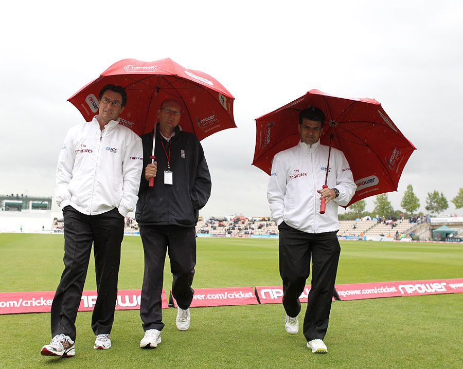 The umpires spent plenty of time under umbrellas