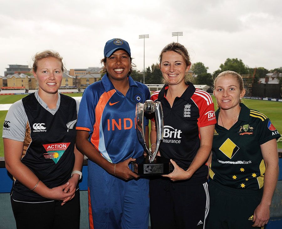 Aimee Watkins, Jhulam Goswami, Charlotte Edwards and Jodie Fields pose with the trophy