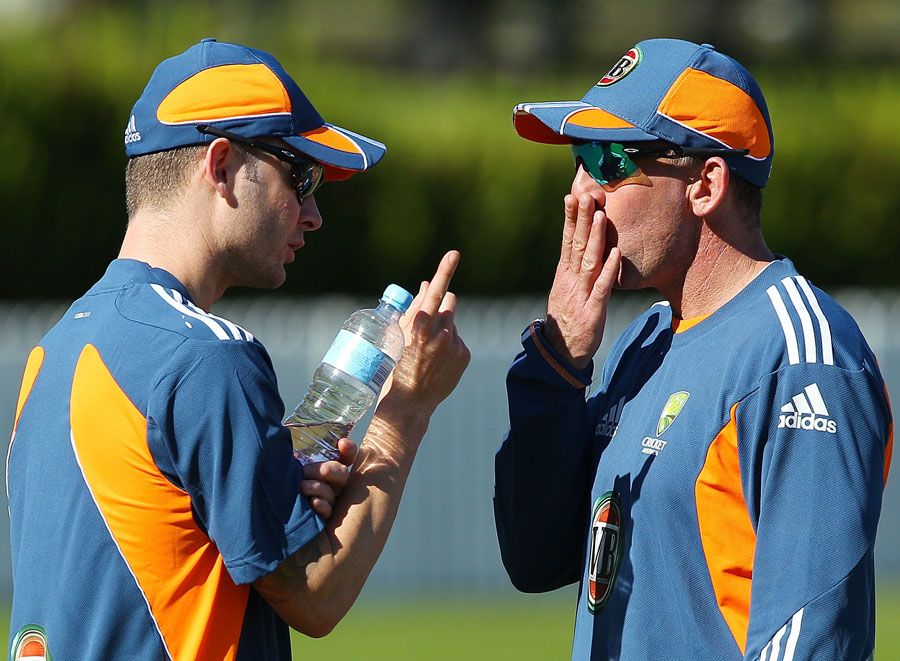 Michael Clarke shares a thought with Tim Nielsen
