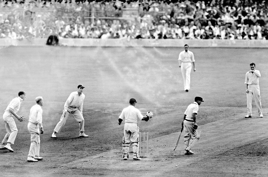 Len Maddocks is bowled for 4 by Jim Laker