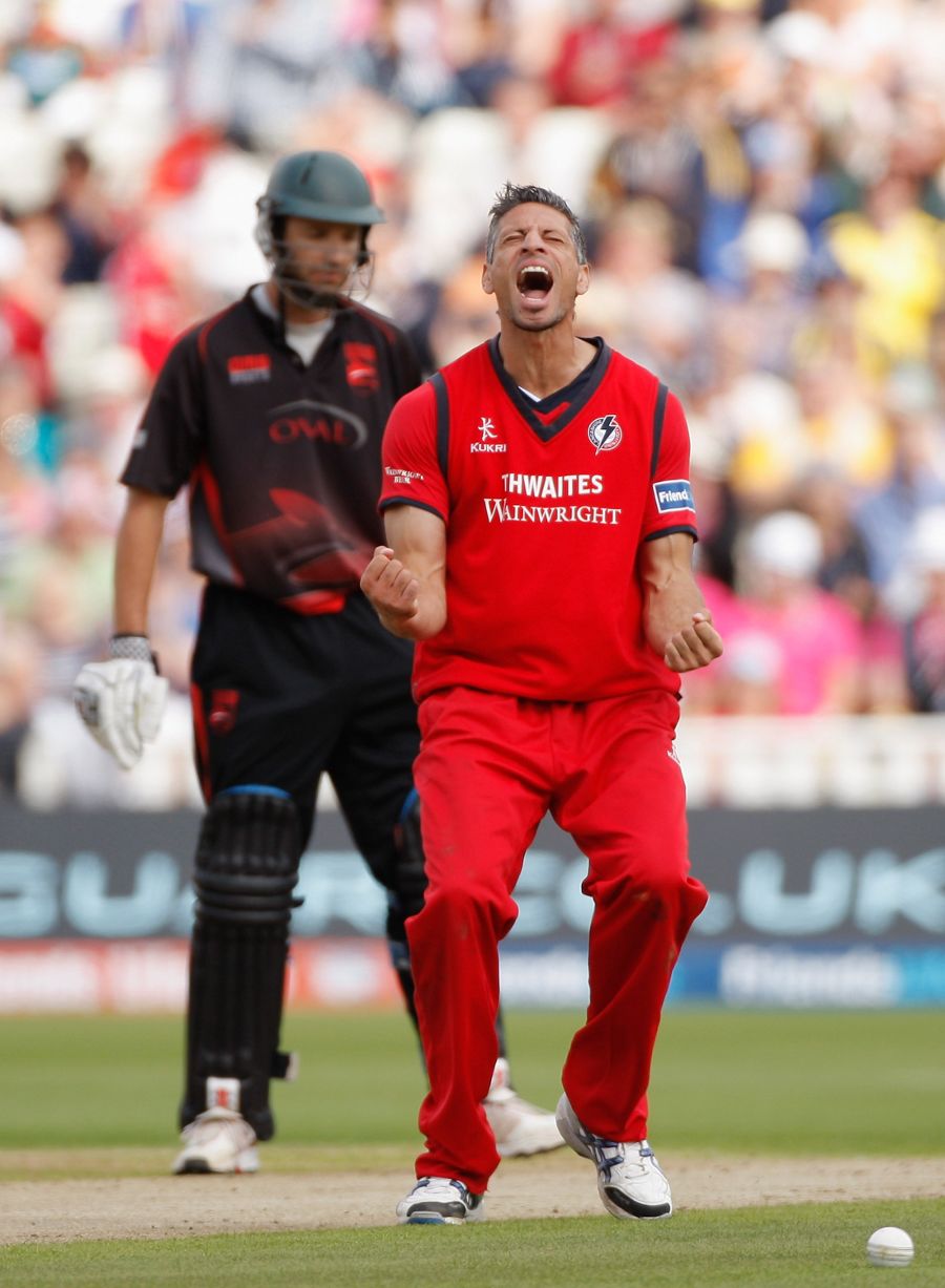 Sajid Mahmood roars in celebration after striking with his first ball of the match