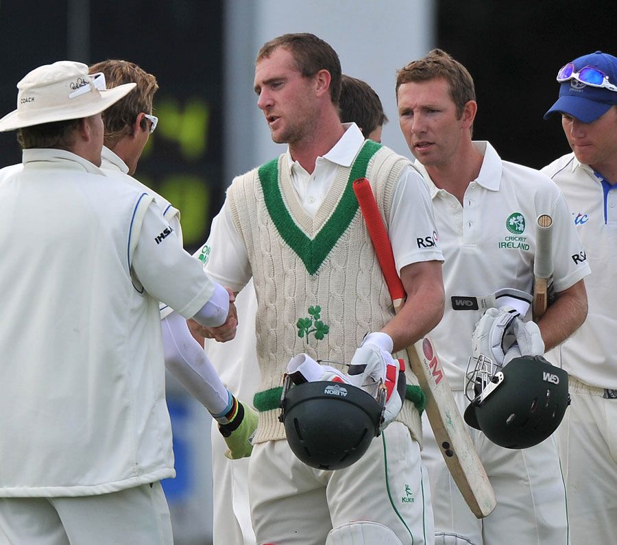 John Mooney and Andrew White are congratulated by the Namibia fielders after the match