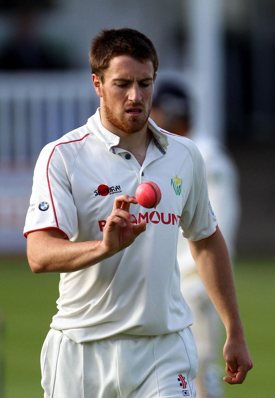 Will Owen prepares to bowl with the pink ball