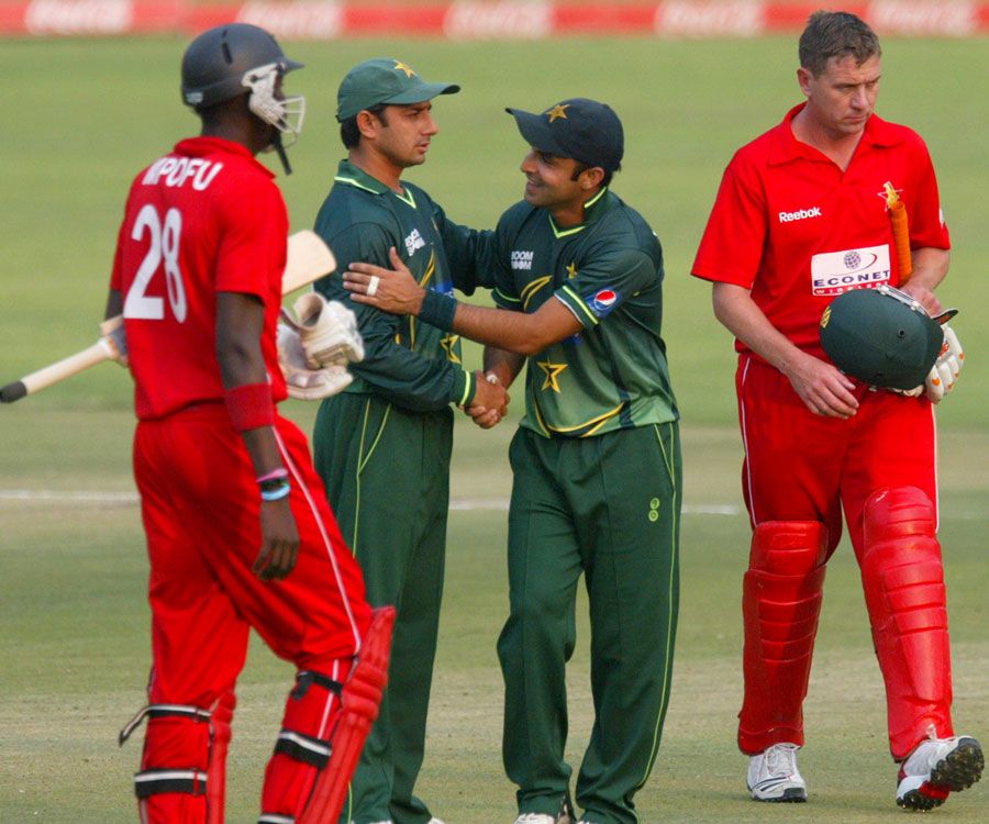 Saeed Ajmal and Rameez Raja celebrate Pakistan's win