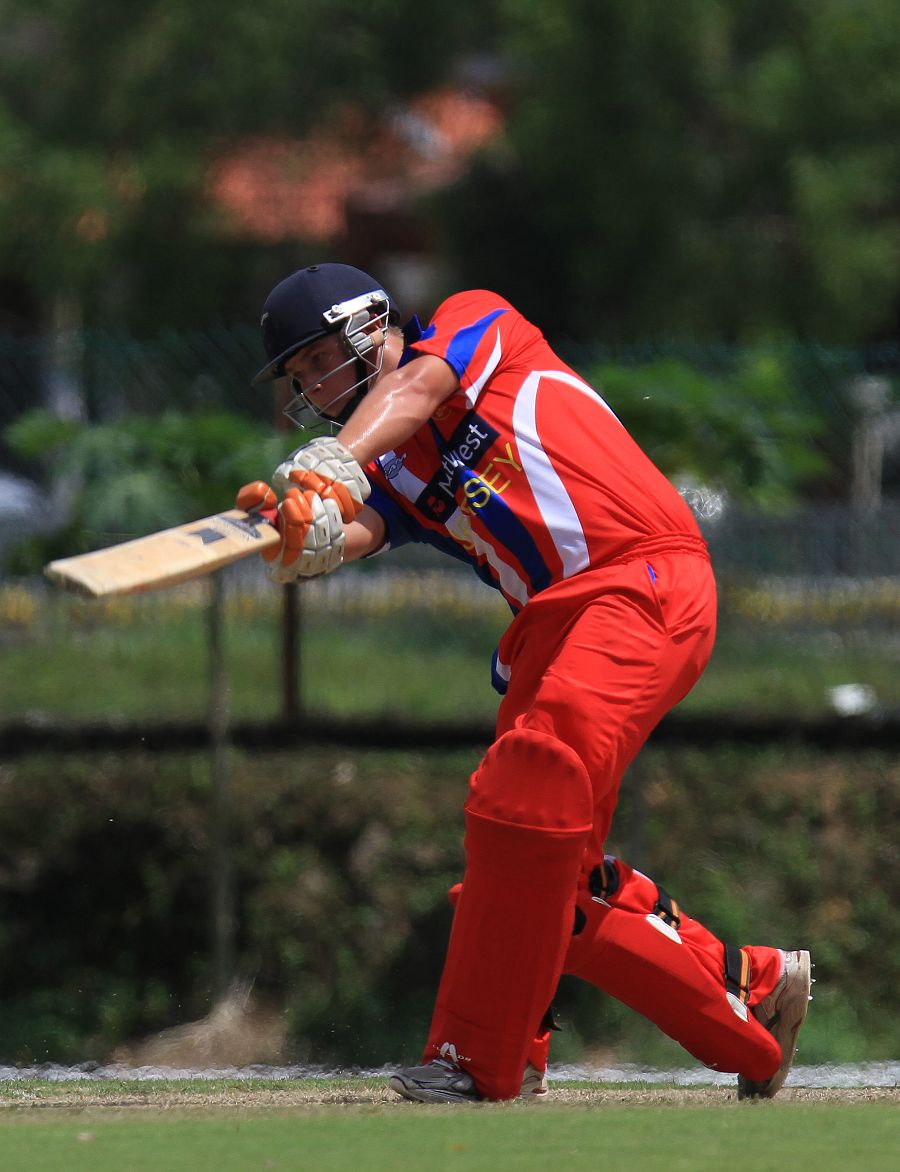 Corey Bisson drives during his half-century