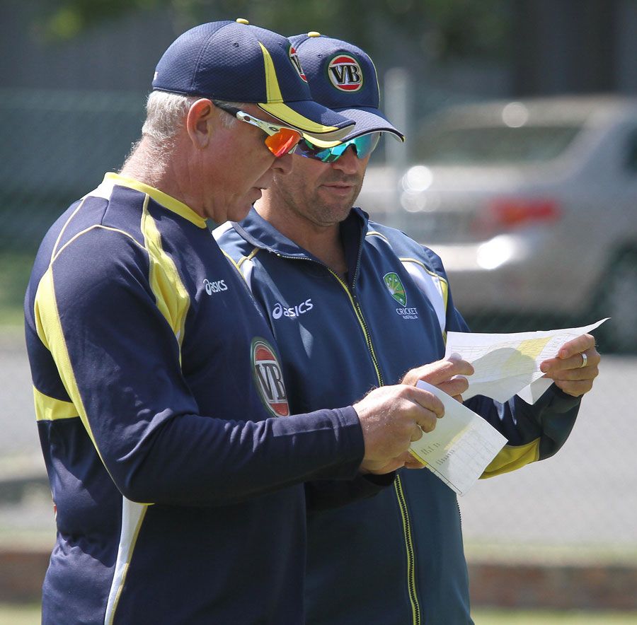 Troy Cooley and Craig McDermott compare notes