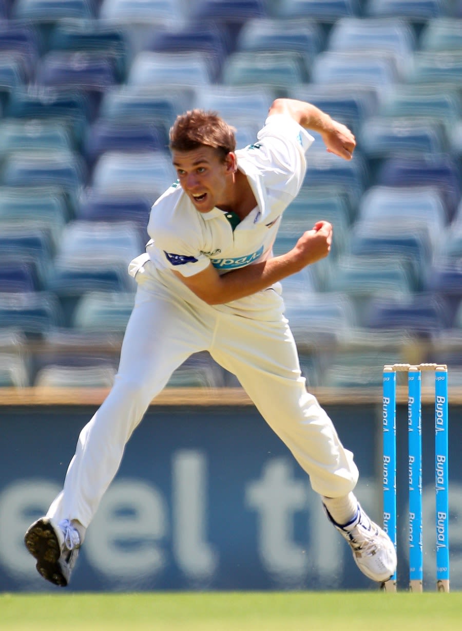 Luke Butterworth delivers during his first innings 4 for 34