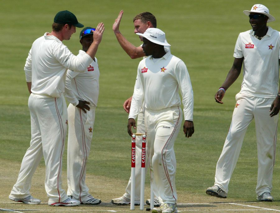 Zimbabwe celebrate the run-out of Kane Williamson