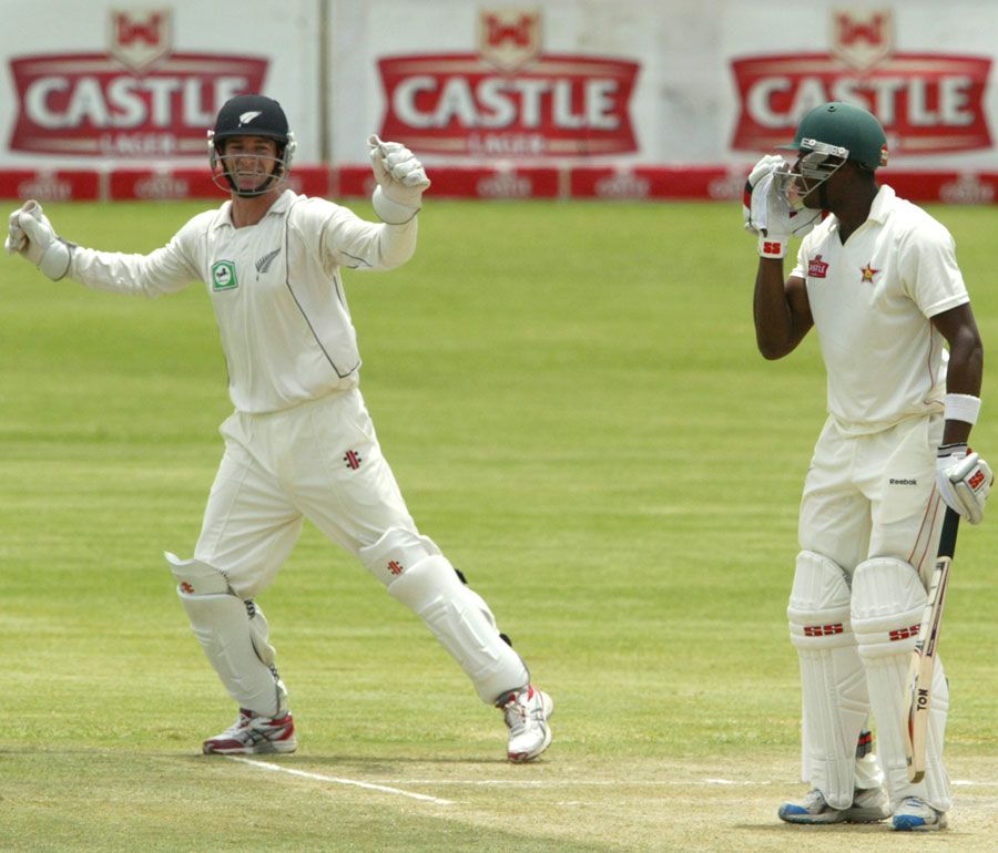 Reece Young celebrates the wicket of Vusi Sibanda