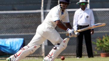 Andhra stay in race with bonus-point win