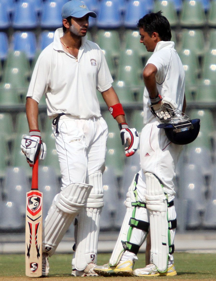 Mayank Sidhana and Uday Kaul have a chat during their stand of 124