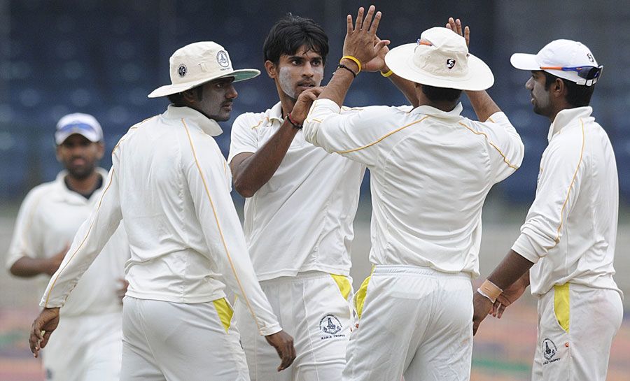 Tamil Nadu's J Kaushik celebrates a wicket