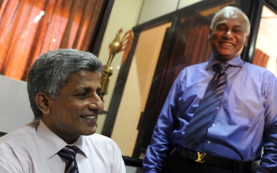 Nishantha Ranatunga, the Sri Lanka Cricket secretary, with Upali Dharmadasa, the new SLC president