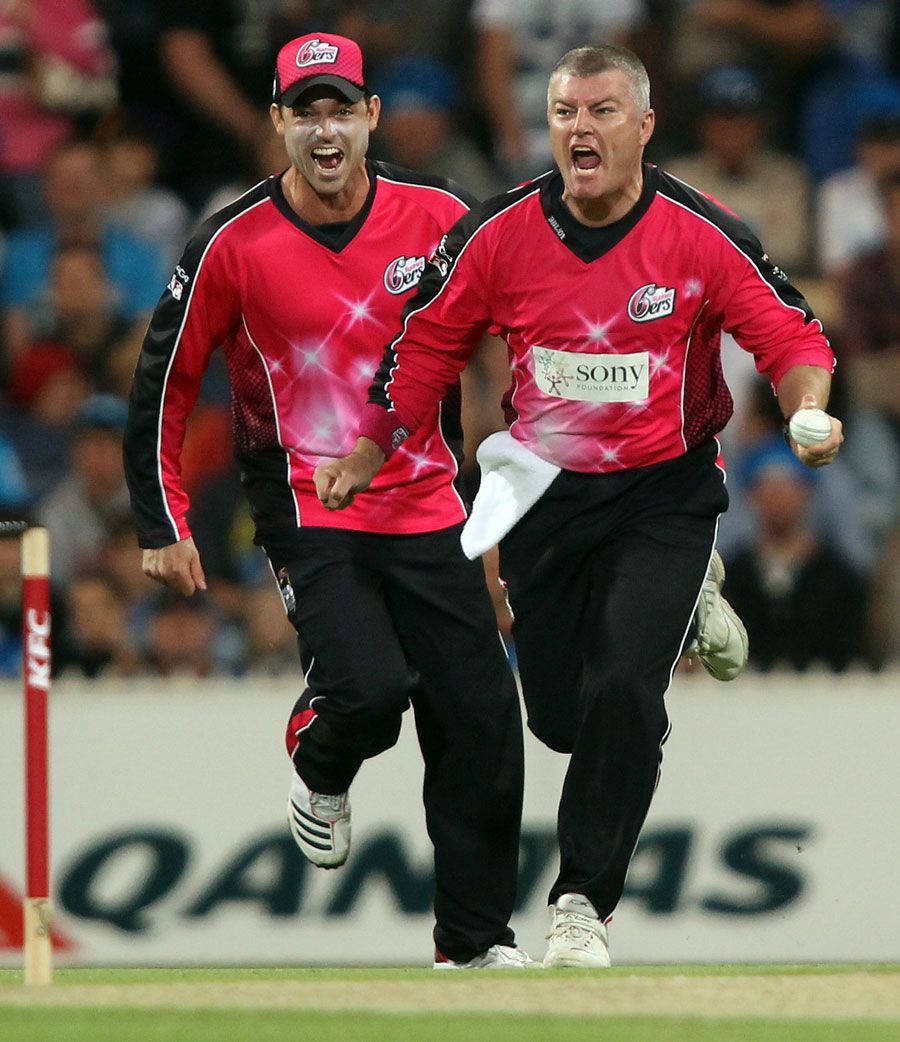 Stuart MacGill celebrates the wicket of Michael Klinger
