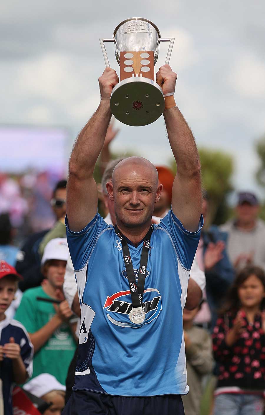 Gareth Hopkins holds aloft the HRV Cup