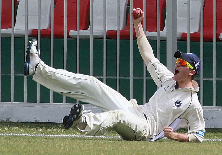Ryan Flannigan takes a catch at the boundary