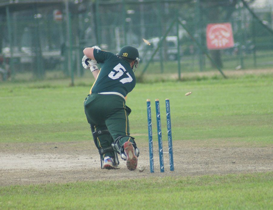 Malaysia stay top after tense win 