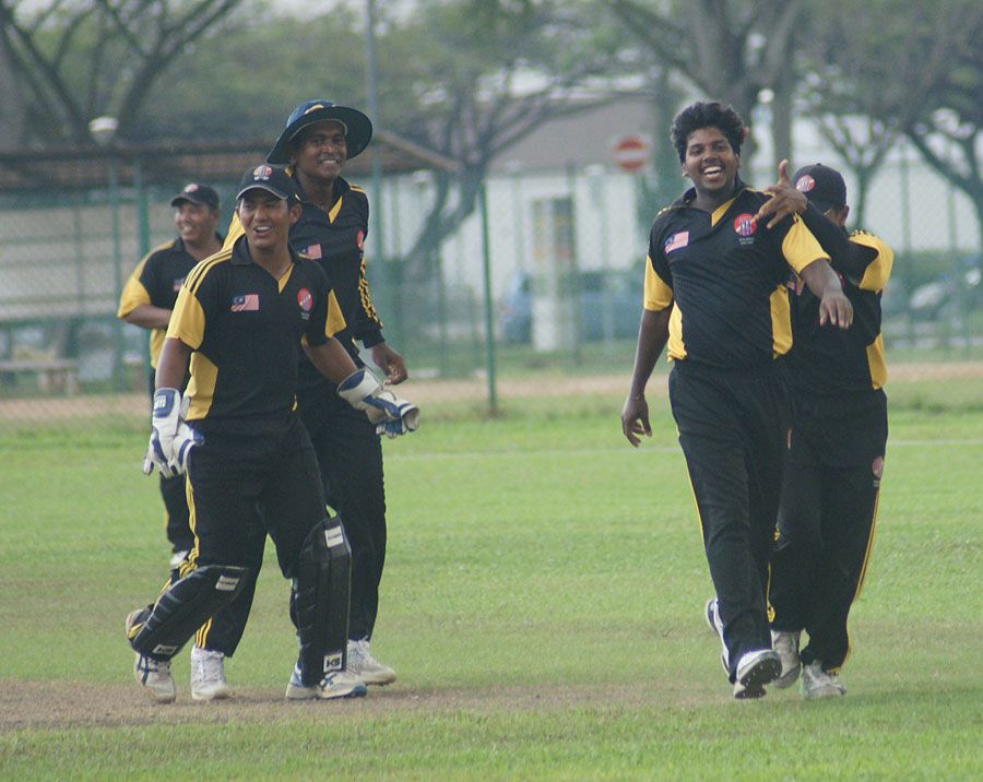 Hiran Ralalage celebrates one of his four match-winning wickets