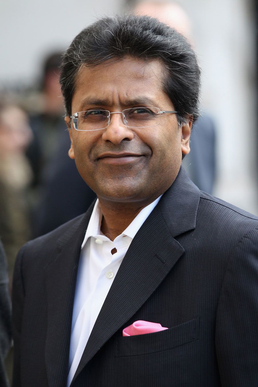 Lalit Modi arrives at the High Court in London for the start of his case against Chris Cairns