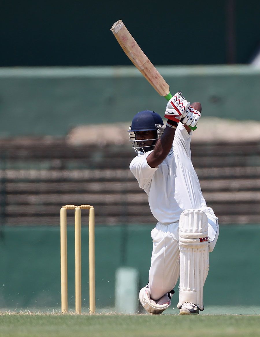 Chamara Silva drives through the covers during his hundred