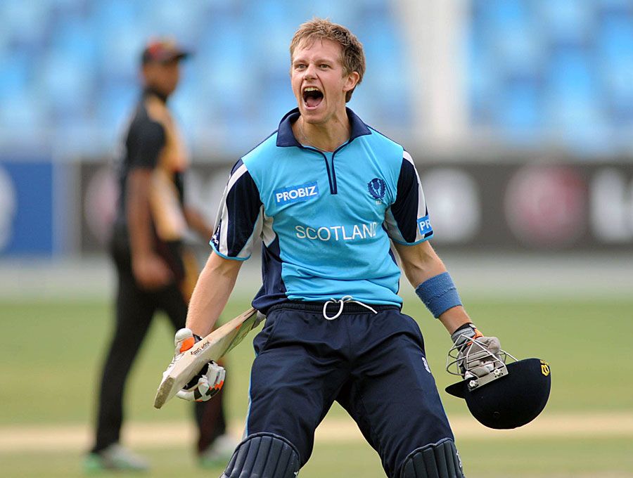Ryan Flannigan roars after getting Scotland the last-ball four they needed against Canada