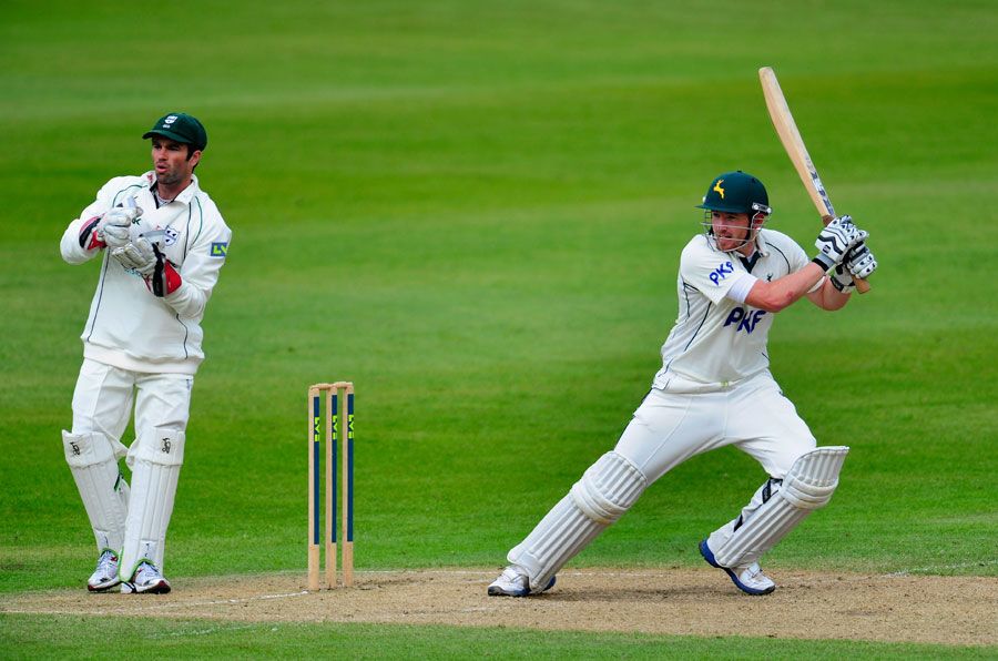 Riki Wessels cuts as Ben Scott looks on