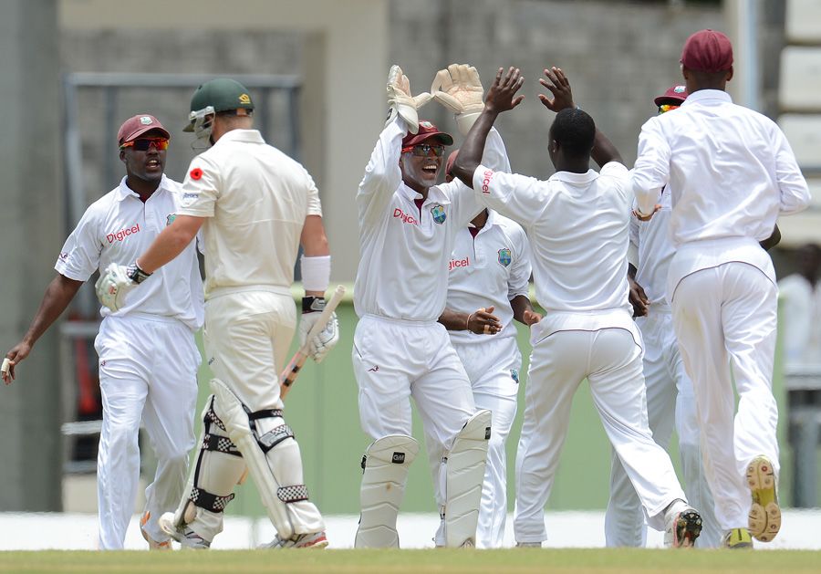 West Indies celebrate the fall of David Warner