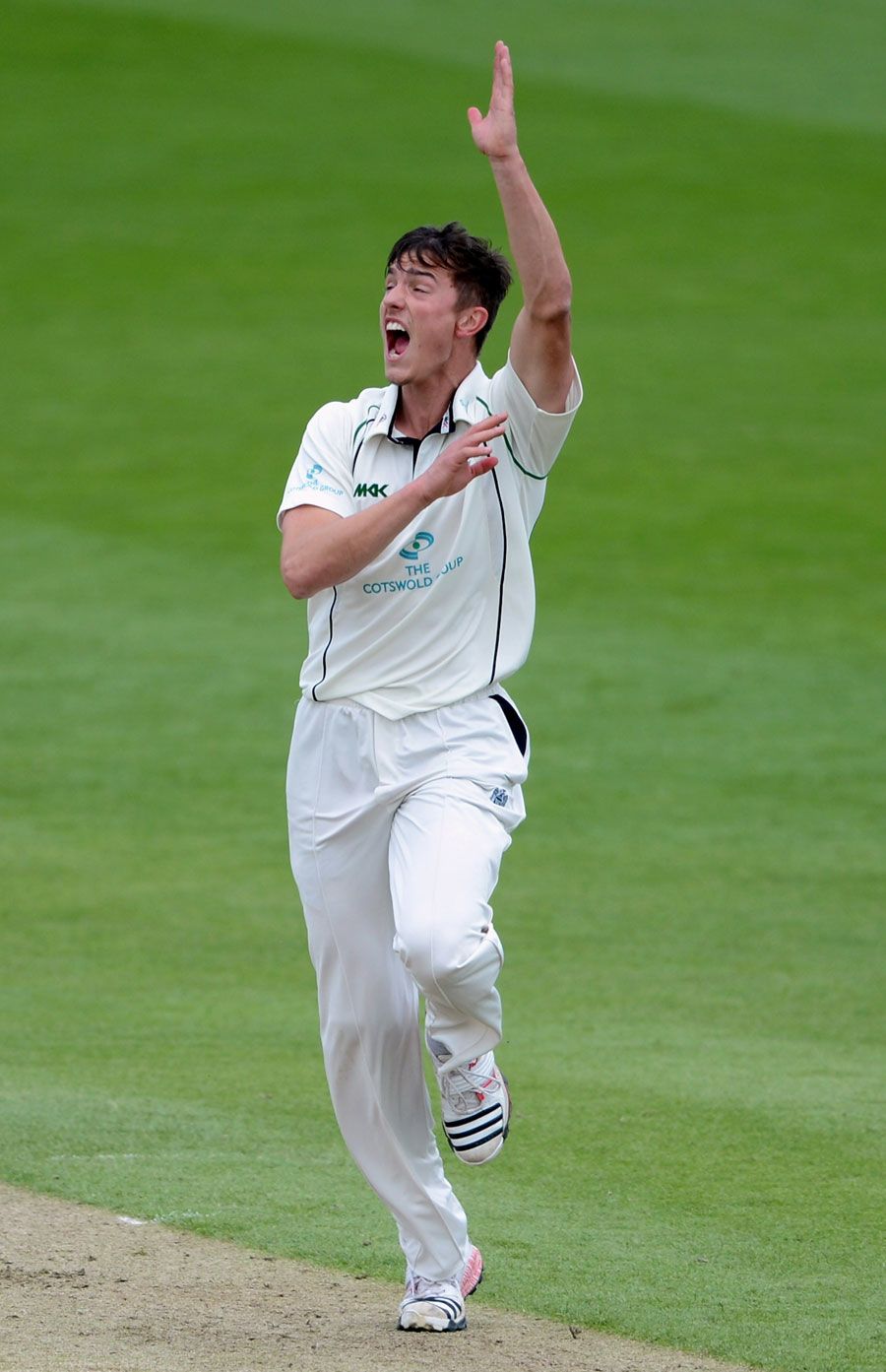 Richard Jones took four wickets as Surrey were forced to follow on