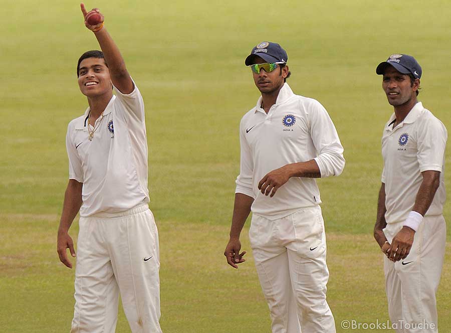 Akshay Darekar celebrates his haul as Manoj Tiwary and Ashok Dinda look on
