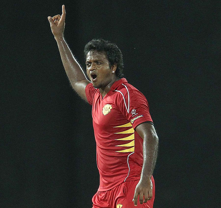 Dilhara Fernando celebrates his five-wicket haul for Uva