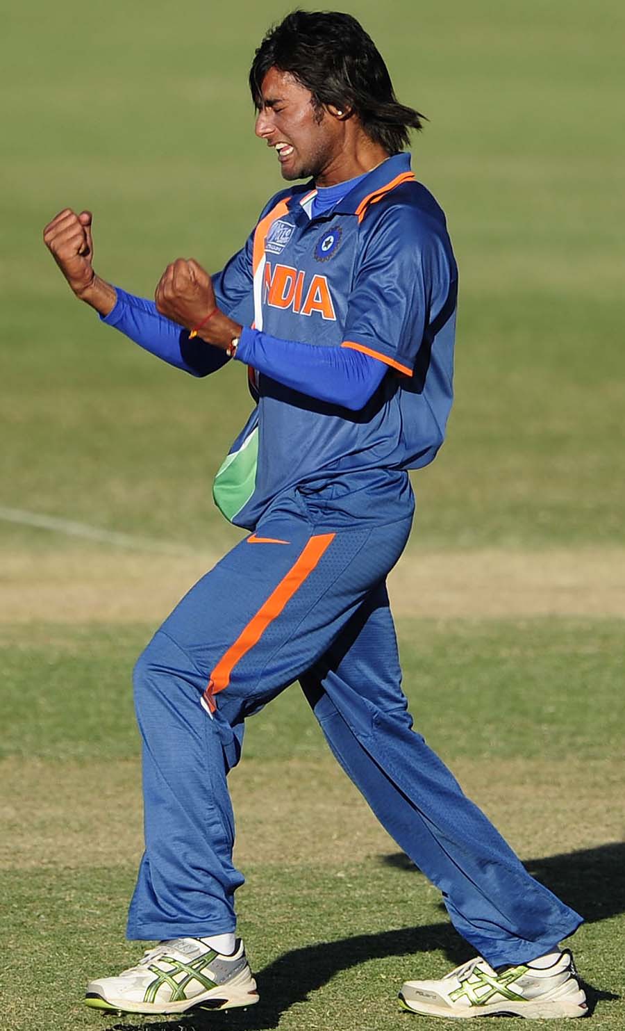 Kamal Passi reacts after taking a wicket