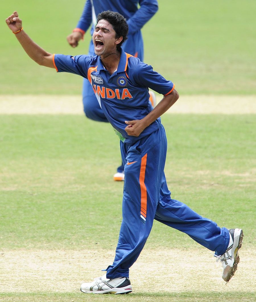 Ravikant Singh celebrates one of his three wickets